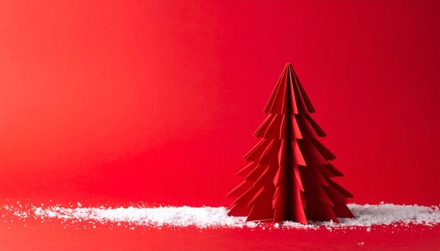 A minimalist Christmas greeting card concept featuring an origami-style folded paper tree