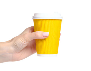 A hand with neatly manicured nails holds a bright yellow corrugated paper cup