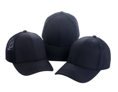 Group shot of three dark blue baseball caps against a black background