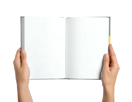 A person's hands hold open a blank book against a black background