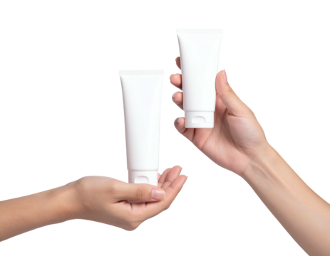 Two hands presenting two white cosmetic tubes against a stark black background