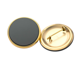 Close-up studio shot depicts two circular pinback badges. One shows the back