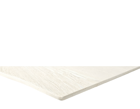 Angled view showing a light-colored wood surface with visible grain against a stark black backdrop