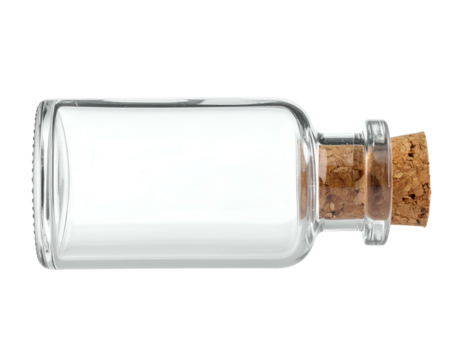 A clear glass bottle with a cork, lying horizontally on a solid black background