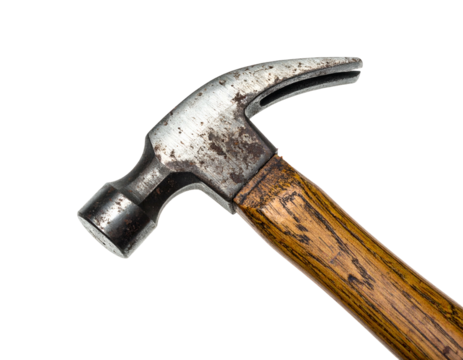 A close-up of a well-used hammer with a wooden handle, isolated on a black background