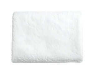 Obraz premium A rectangular, fluffy, white object, likely a pillow or pad, isolated against a black backdrop