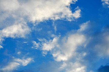 Beautiful storm clouds on a summer night with pinks and blues.
