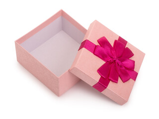 Beautiful opened pink gift box with ribbon