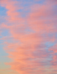 Beautiful pastel sky with pink clouds at sunset.