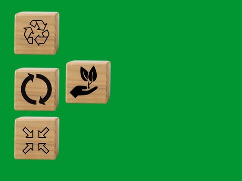 Minimise, Repurpose, and Recycle Display an environmental message promoting 3R sustainability on a wooden cube with a green background. The cube provides space for words.	