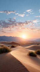 Vibrant sunset over a desert landscape with rolling dunes and a clear sky.