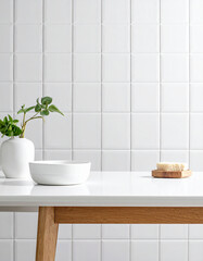An interior bathroom table with a white mosaic tiles wall.