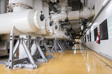 High-voltage gas-insulated switchgear (GIS) equipment inside a modern power plant, showing advanced electrical components for energy distribution, safety, and efficient power transmission