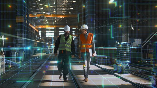 Two Engineers in Helmets and Safety Vests Walk Through High Tech Factory Enhanced by Glowing AR Grid. Concept of Smart Manufacturing, Industrial Innovation, Fusion of Humans With Digital Intelligence. - Powered by Adobe