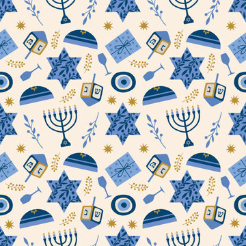 Hanukkah vector illustration featuring a seamless pattern of dreidels, menorahs, and Stars of David in blue and gold hues. Kippahs, branches, and gifts enhance the festive design.
