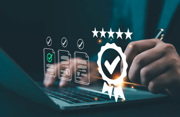 Businessman working on laptop with digital certification icon, concept of quality assurance, document approval, standard management, verified process, and high customer satisfaction.