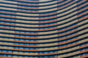 Obraz premium modern apartment building with balconies and laundry drying in Shanghai, China