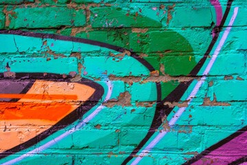 Vibrant graffiti art featuring bold neon colors on brick wall. 90s style, fluorescent accents, street art vibe. Urban murals, funky backgrounds, creative design, modern visuals. © Aleksandra Konoplya