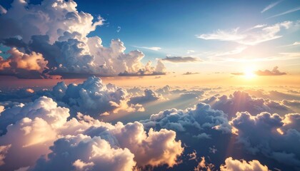 Breathtaking aerial view of cumulus clouds illuminated by golden sunlight at sunset