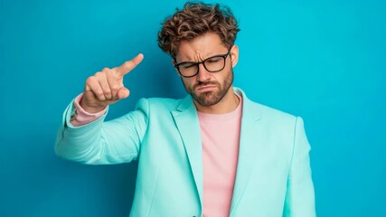 Expressive man with spectacles and curly locks, showing dissatisfaction, points single digit - Powered by Adobe