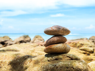 Stone stack zen balance on calm water background sea spa stability concept template relax massage harmony peace, pile pebble at coast ocean nature landscape outdoor.