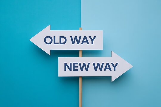 Two directional signs pointing in opposite directions one labeled old way and the other new way against a split blue background