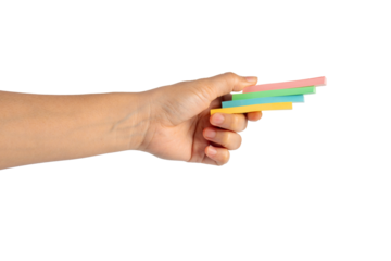 Paper stickers in hand. Hand holding a green sticker. Notes for the message on transparent background.