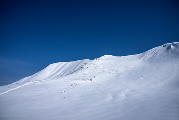 Winter landscape of the Caucasus Mountains in Gudauri, Georgia.
