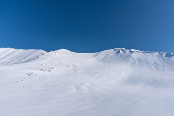 Winter landscape of the Caucasus Mountains in Gudauri, Georgia.