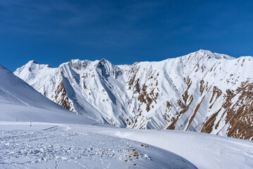 Winter landscape of the Caucasus Mountains in Gudauri, Georgia.