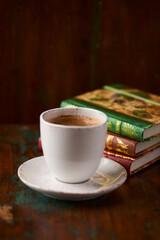 Cup of coffee on rustic wooden background. Soft focus. Copy space	