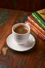 Cup of coffee on rustic wooden background. Soft focus. Copy space	