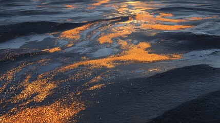 Golden light dances on the ocean s surface like liquid fire flowing gently into the blue sea captured in a dramatic