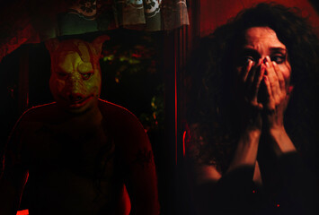 Frightened woman and person in pig mask in dark suspenseful setting