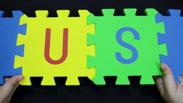 education and spelling concept using interlocking EVA letters word LUST on black background