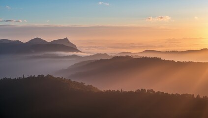 Obraz premium sunrise in the mountains,sunrise in the mountains, dawn over the peaks, morning light on the ridges, first light in the highlands, golden sunrise on the slopes, misty dawn in the mountains, early sun 