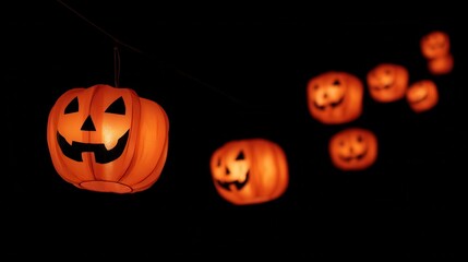 Spooky Halloween Lanterns Glowing Against Dark Background