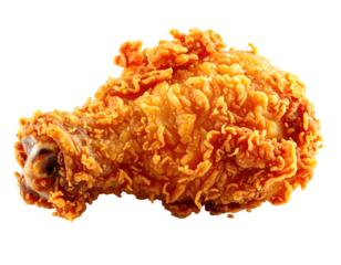 Isolated shot of a crispy, golden-brown fried chicken drumstick. A food photography classic