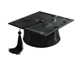 Isolated black graduation cap with tassel, angled slightly right, set against a black background