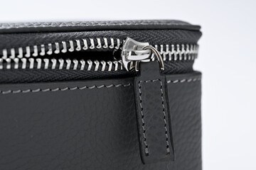 zipper on black leather