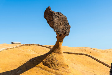 Fototapeta premium Beautiful Queen's Head of the Yehliu Geopark. Yehliu is a cape located in Wanli, New Taipei City, Taiwan.