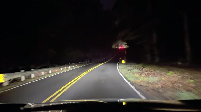 pov night drive on a dark country road