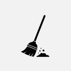 Black silhouette of a broom sweeping up a pile of dirt or debris on a white background.