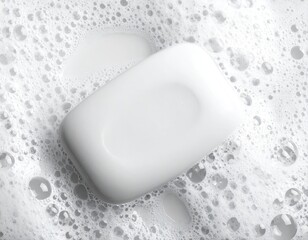 White bar of soap in bubbles, clean and refreshing