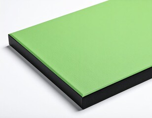 Green textured surface with a black side panel
