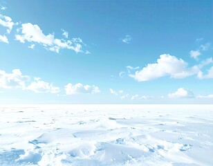 Vast, snowy field under bright, partly cloudy sky