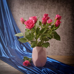 Bouquet of pink roses, still life, blue background, holiday card.