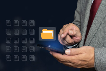 Person using smart phone  document management system on virtual screen. Document Management System DMS. Enterprise Resource Planning ERP. Search and manage document database files online.
