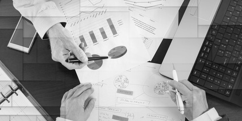 Businesspeople having a discussion about financial report, geometric pattern