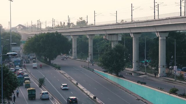 Punjabi Bagh Delhi road view with moving traffic and metro bridge